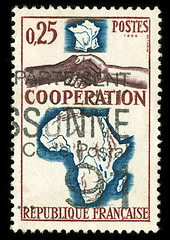 Image showing vintage French stamp depicting a black and white man shaking hands