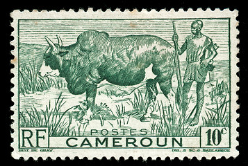 Image showing vintage stamp from cameroon depicting tribal farmer