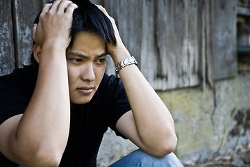 Image showing Stressed asian male