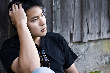 Image showing Stressed asian male