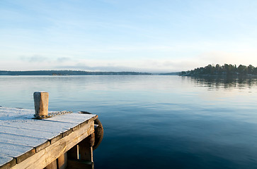 Image showing View over a calm lake