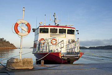 Image showing Lifebuoy and a moored ship