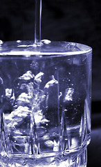 Image showing filling a glass of water