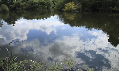 Image showing reflection of clouds