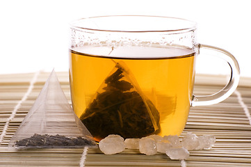 Image showing white tea, nylon tea-bag and sugar