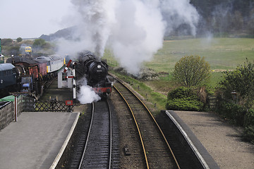 Image showing locomotive entering a station