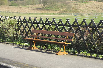 Image showing wooden bench on a station