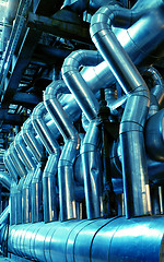 Image showing Pipes, tubes, machinery and steam turbine at a power plant