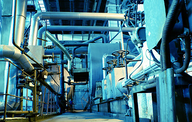 Image showing Pipes, tubes, machinery and steam turbine at a power plant