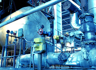 Image showing Pipes, tubes, machinery and steam turbine at a power plant