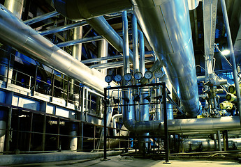 Image showing Pipes, tubes, machinery and steam turbine at a power plant