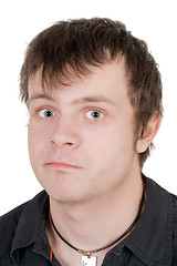 Image showing Portrait of the surprised young man. Isolated