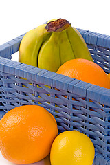 Image showing blue basket with fruits