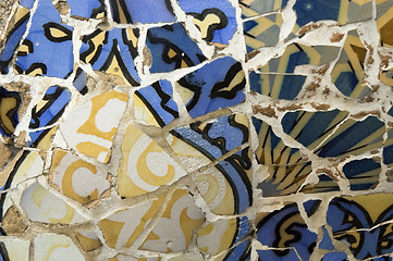 Image showing Detail of the ceramics from the Guadi bench in park Guell Barcelona, Spain