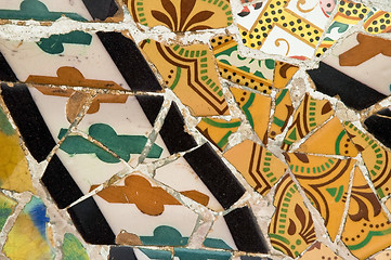 Image showing Detail of the ceramics from the Guadi bench in park Guell Barcelona, Spain