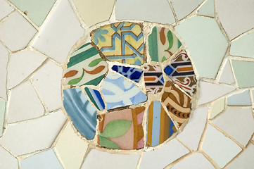 Image showing Detail of the ceramics from the Guadi bench in park Guell Barcelona, Spain