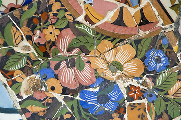 Image showing Detail of the ceramics from the Guadi bench in park Guell Barcelona, Spain