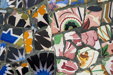 Image showing Detail of the ceramics from the Guadi bench in park Guell Barcelona, Spain