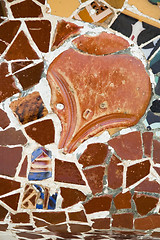 Image showing Detail of the ceramics from the Guadi bench in park Guell Barcelona, Spain