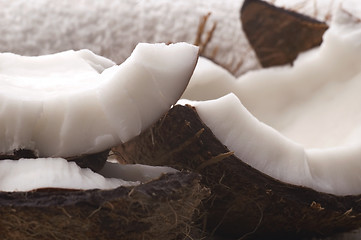 Image showing open coconut and white towel