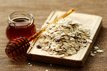 Image showing oatmeal and honey