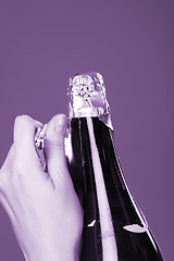 Image showing Opening champagne bottle