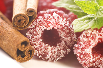 Image showing sweet raspberries, cinnamon and fresh mint