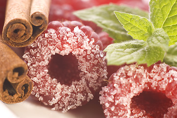 Image showing sweet raspberries, cinnamon and fresh mint