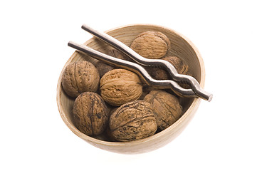 Image showing walnuts and nutcracker