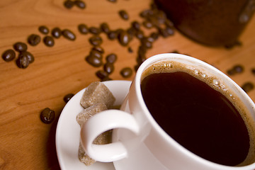 Image showing cup of coffee, sugar and beans