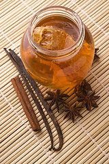 Image showing fresh honey with honeycomb and spices