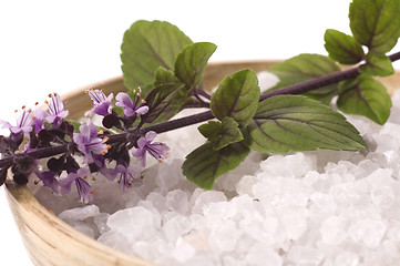 Image showing aroma bath. sea salt and basil with flowers