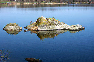 Image showing Rocks in a calm lake