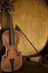 Image showing Antique Violin, Bow, And Chair