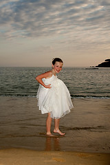 Image showing Flower girl in the sand