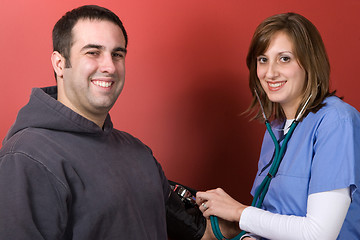 Image showing Checking Blood Pressure