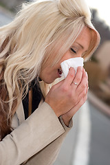 Image showing Blowing Her Nose