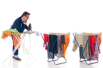 Image showing Houseman doing the laundry