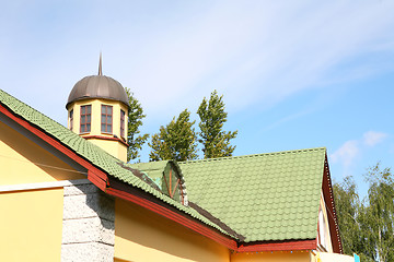 Image showing yellow house with green roof