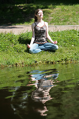 Image showing girl is meditating