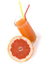 Image showing half of grapefruit and juice