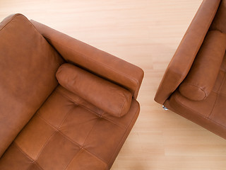 Image showing Two brown leather sofas