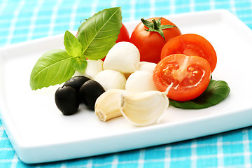 Image showing mozzarella and cherry tomatoes