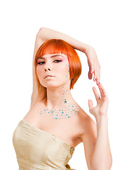 Image showing Redhead with rhinestones