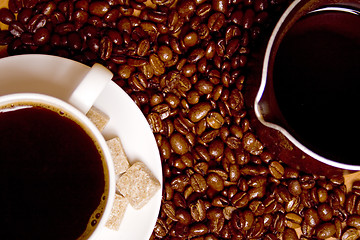 Image showing coffee, caffee-maker over beans background