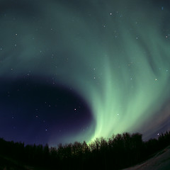 Image showing Round aurora rolling out