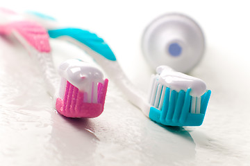 Image showing toothpaste and toothbrushes