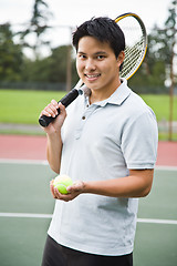 Image showing Asian tennis player