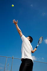 Image showing Asian playing tennis