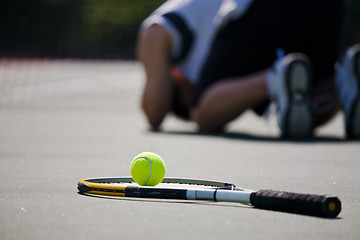 Image showing Sad tennis player after defeat